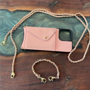 Pink bandolier case like new with pink chain and wrislet